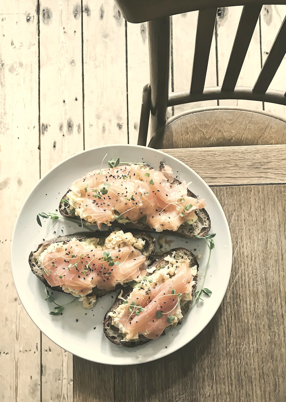 Protein-rich plate of smoked salmon and egg on toast — adequate protein, iron, zinc, and vitamin D are the most effective ways to prevent GLP-1 hair loss